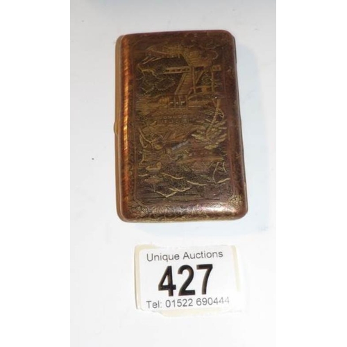 427 - A Japanese bronze cigarette case, signed