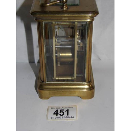 451 - A brass carriage clock, missing back door