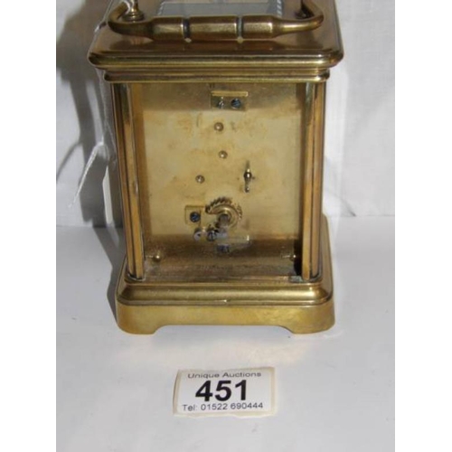 451 - A brass carriage clock, missing back door