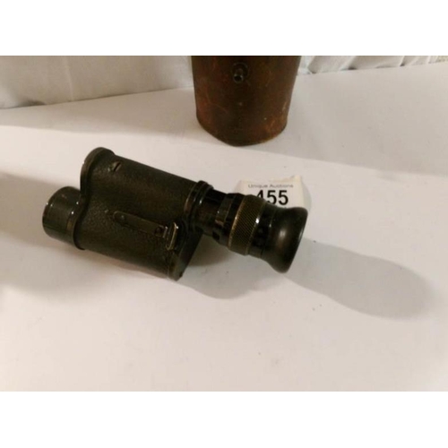 455 - A leather cased monocular