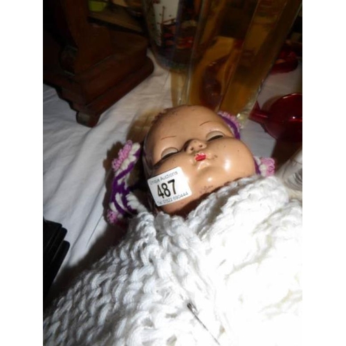 487 - A vintage baby doll