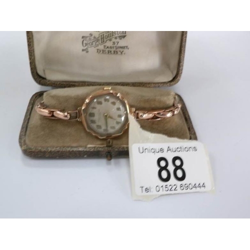 88 - A Victorian 9ct rose gold ladies wrist watch by James Walker of London, in working order, approximat... 