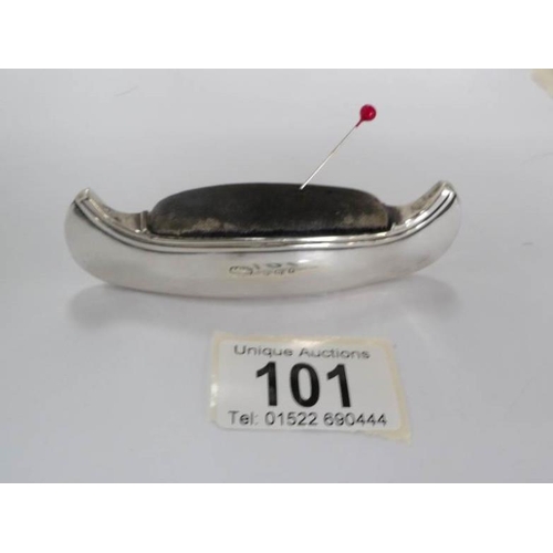 101 - A silver pin cushion in the shape of a canoe with Birmingham hall mark