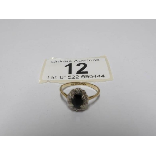 12 - A 9ct gold and diamond ring size N and a 9ct gold diamond and sapphire ring also size N