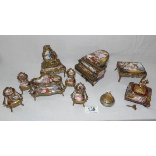 139 - A collection of 19th century Austrian hand painted music boxes and other items including a grand pia... 