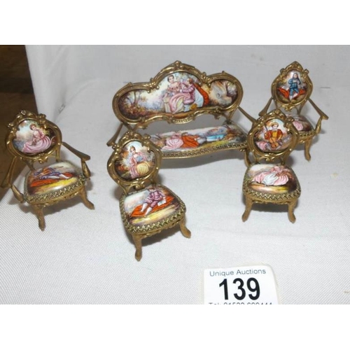 139 - A collection of 19th century Austrian hand painted music boxes and other items including a grand pia... 