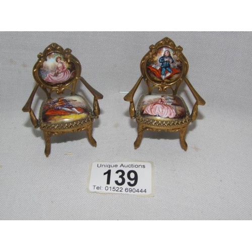 139 - A collection of 19th century Austrian hand painted music boxes and other items including a grand pia... 