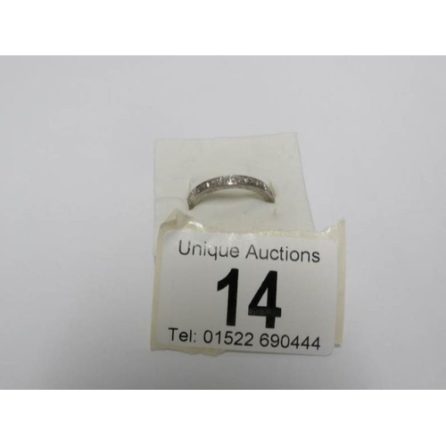 14 - A white gold and diamond eternity ring, size M