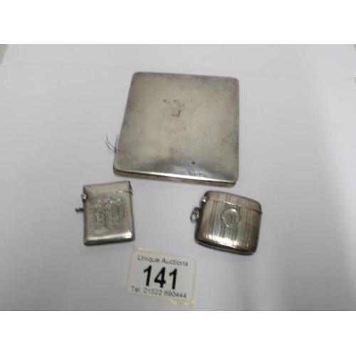 141 - A silver card case and 2 silver vesta cases