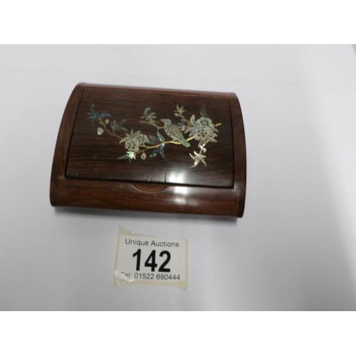 142 - A Victorian rosewood trinket box in inlaid with mother of pearl