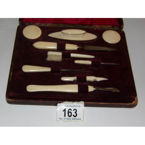 163 - A cased 1920's French ivory handled manicure set