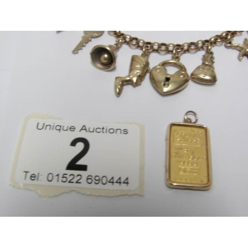 2 - A gold charm bracelet and a 5g gold ingot

Ingot marked as fine gold 999.9
Bracelet 15gms, marked 37... 