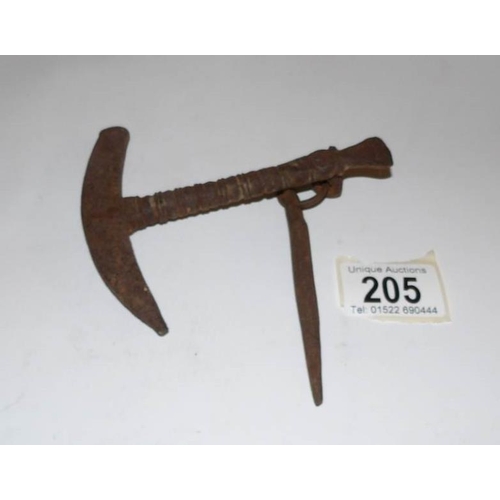 205 - An unusual hand tool, possibly for use with horses