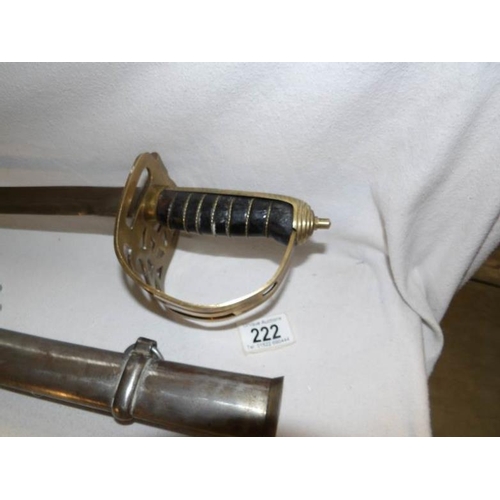 222 - An officer's cavalry sword with pierced brass hilt and complete with scabbard