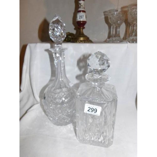 299 - 2 cut glass decanters