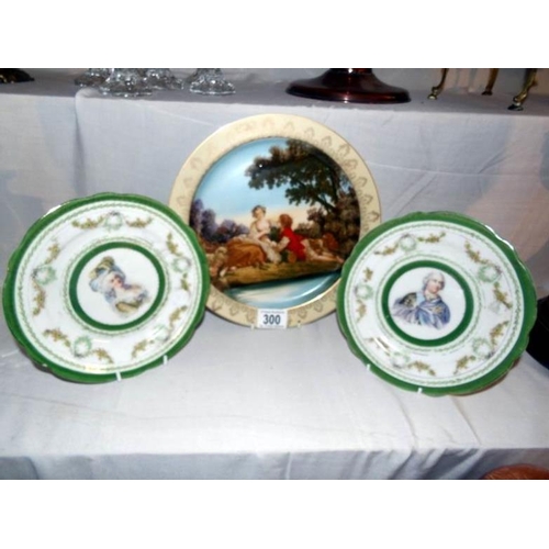 300 - A hand painted cabinet plate and 2 portrait plates