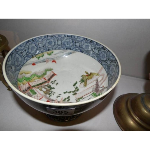 305 - A Chinese footed bowl with painted scenes to body and interior