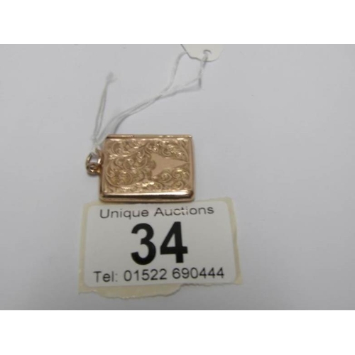 34 - A 9ct gold stamp case shaped as an envelope, H M Chester 1923