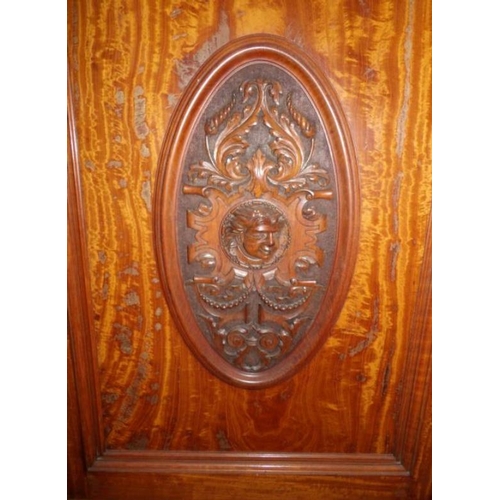 1039 - A 19th century satin wood wardrobe