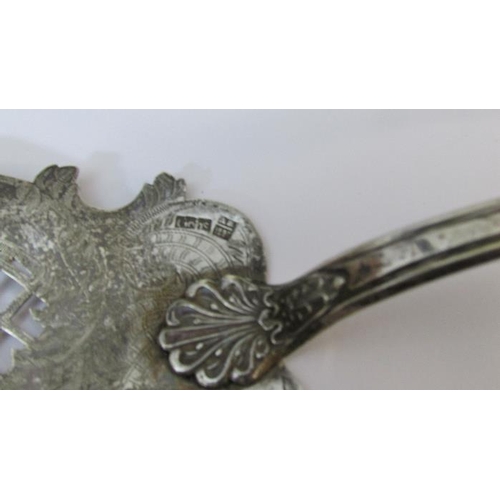 245 - An ornate 19th century fish slice (possibly continental silver)