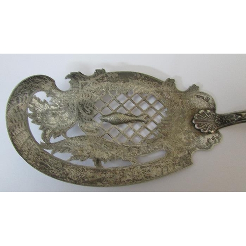 245 - An ornate 19th century fish slice (possibly continental silver)