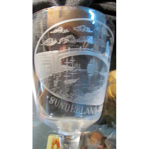 281 - An unusual wine glass engraved with a scene of Sunderland Bridge

Good condition with no damage obse... 