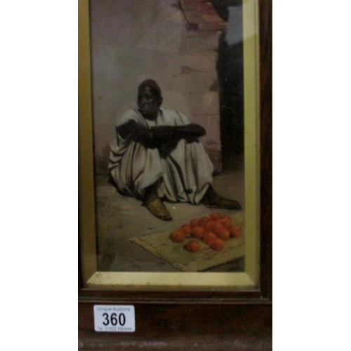 360 - An oak framed and glazed watercolour study of a fruit seller, signed Floreg 1905