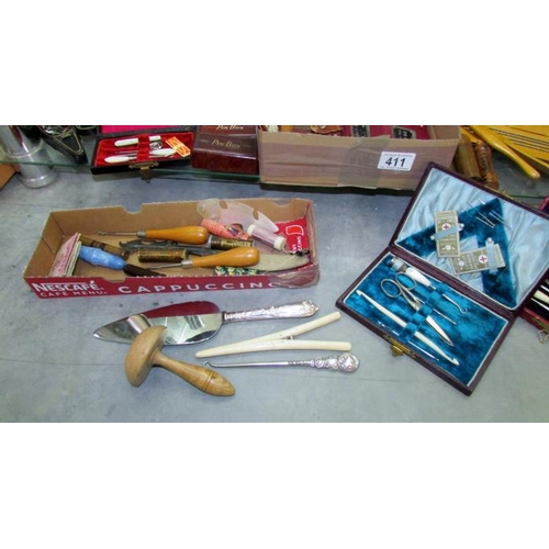 411 - A good lot of vintage cased sewing sets and other needlework items