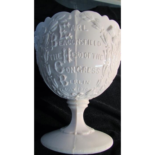 445 - A white glass footed bowl inscribed 'Earl of Beaconsfield, The Hero of the Congress, Berlin, July 18... 