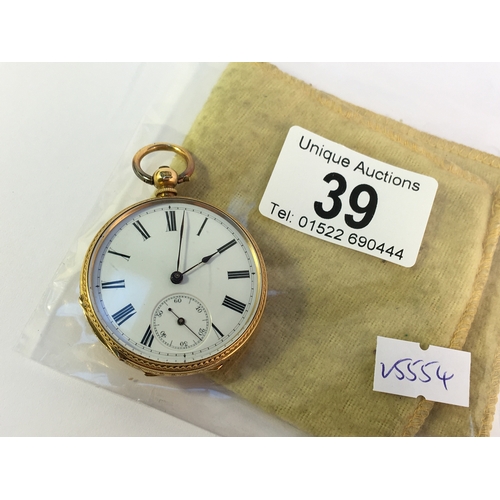 39 - An 18ct gold ladies fob watch in full working order