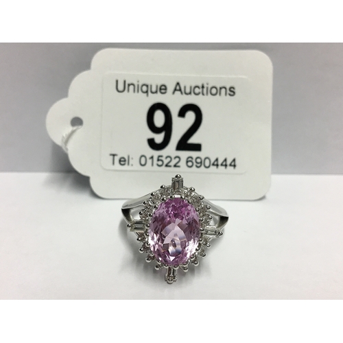 92 - A Kunzite gem set ring with brilliant and baguette diamonds to surround in 18ct white gold