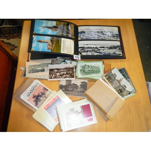 179 - An album of large postcards & old postcards etc.