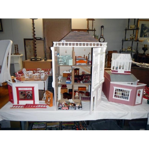 230 - A large dolls house & accessories etc.