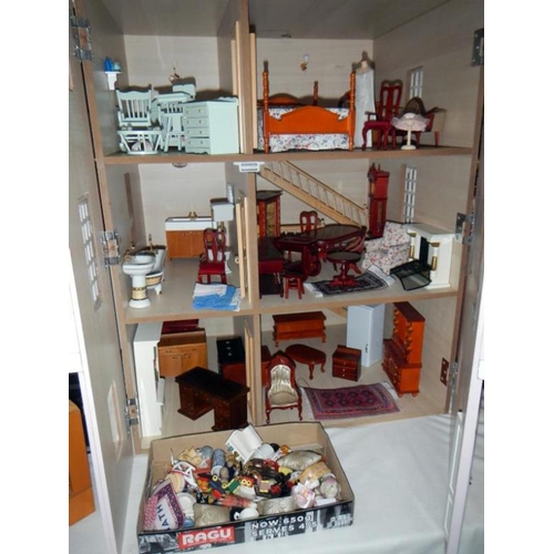 230 - A large dolls house & accessories etc.