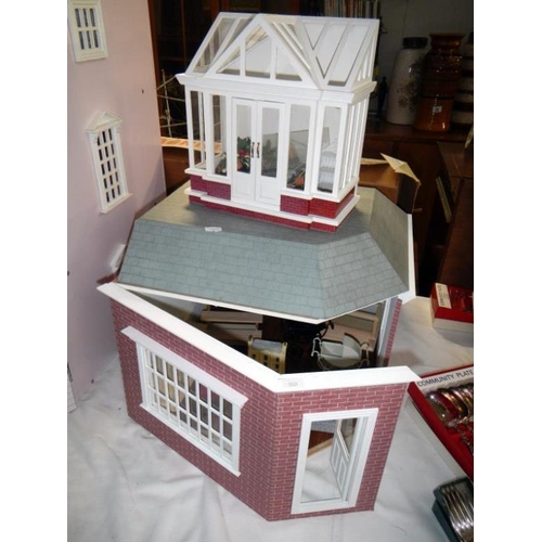 230 - A large dolls house & accessories etc.