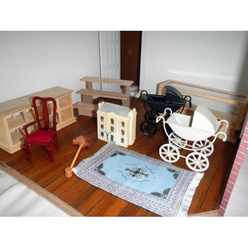 230 - A large dolls house & accessories etc.