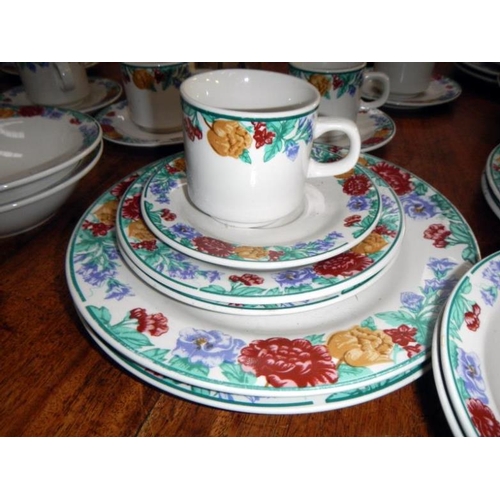 243 - A flower patterned dinner/tea set (80 pieces)