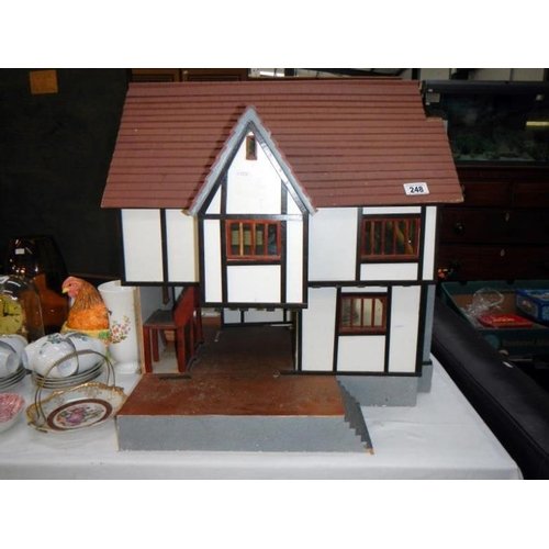 248 - A Tudor style dolls house