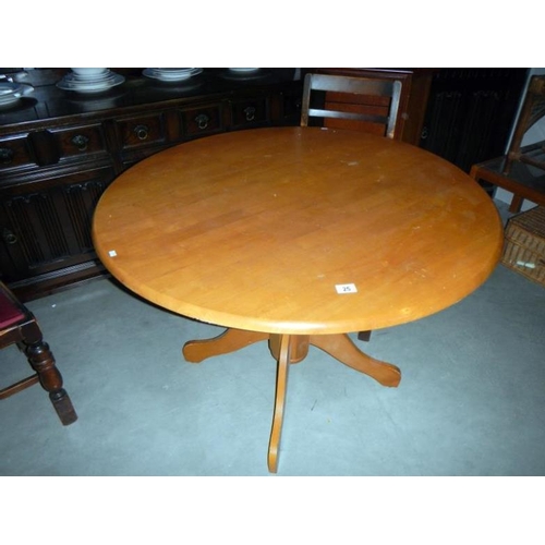 25 - A circular dining table