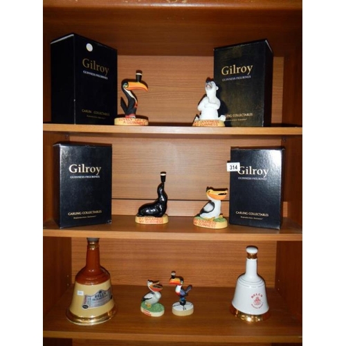 314 - 4 boxed Guinness Gilroy figurines, 2 Guinness figurines (1 A/F) & 2 empty Bells bottles