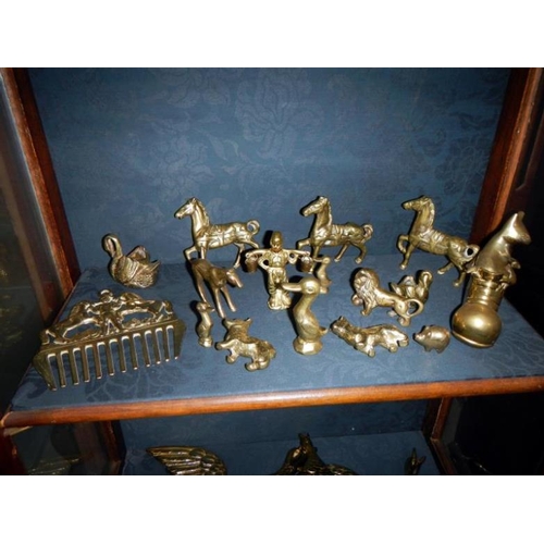 344 - A quantity of brass figures etc. (28 pieces)