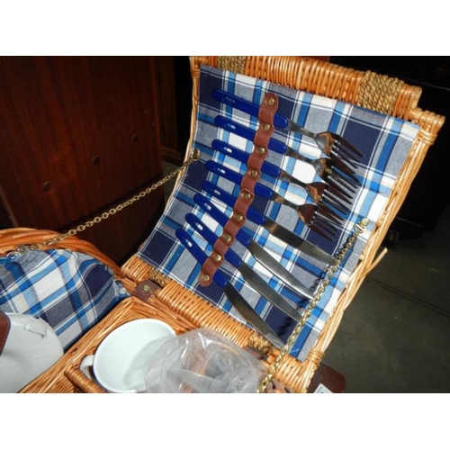 355 - An arched picnic hamper, complete & unused