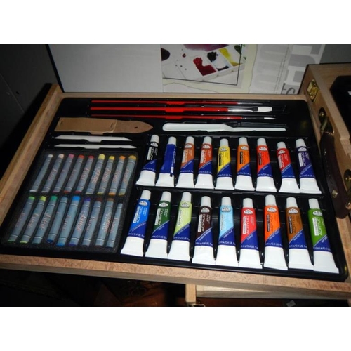 42 - A very good quality 'artists' box, easel, paints, acrylics & pencils etc.