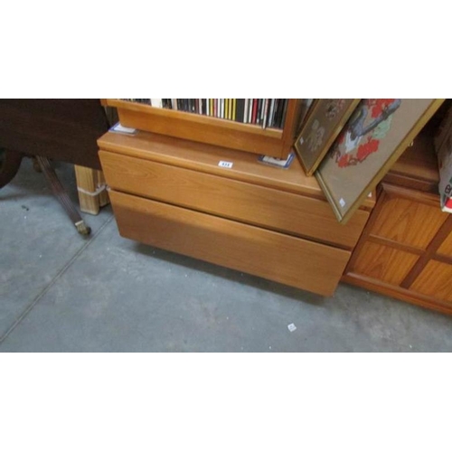 434 - A teak 2 drawer chest