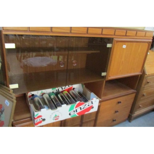 438 - A teak wall unit