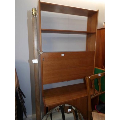 472 - A teak wall unit