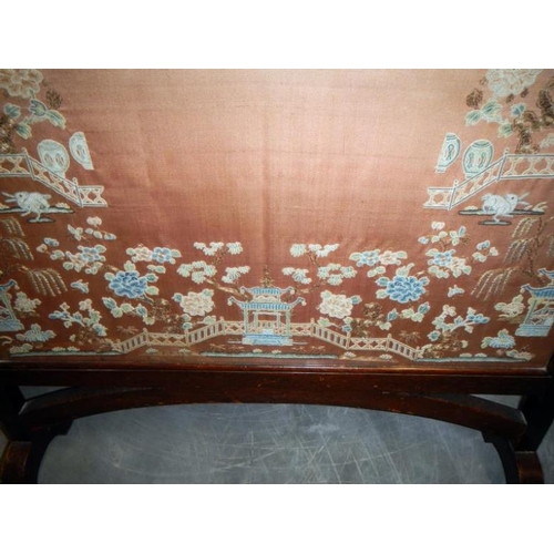 52 - A fire screen with a Chinese silk panel