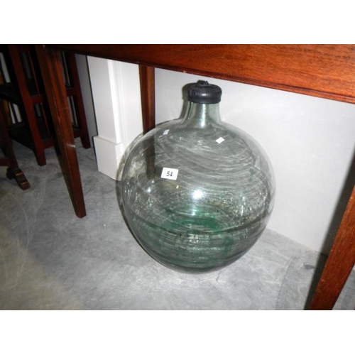 54 - A large glass carboy