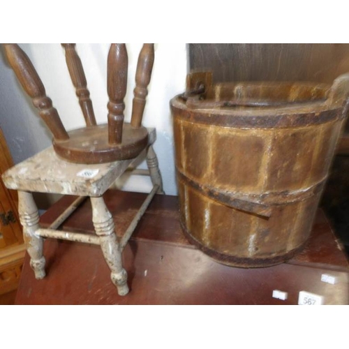 566 - An old wooden pail and 2 stools