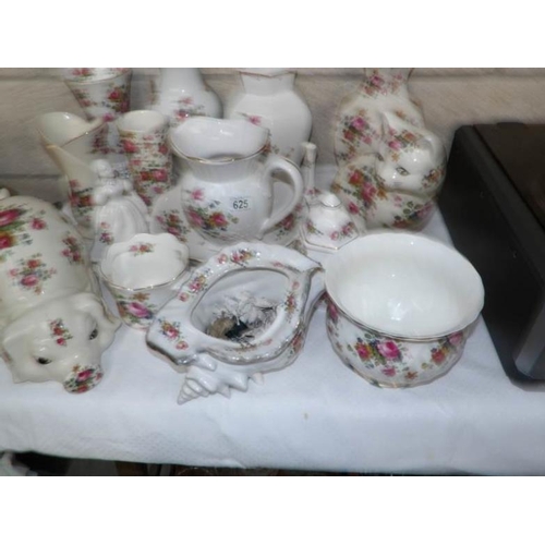 625 - A mixed lot of rose decorated china